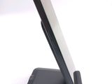 a cell phone that is sitting on top of a stand