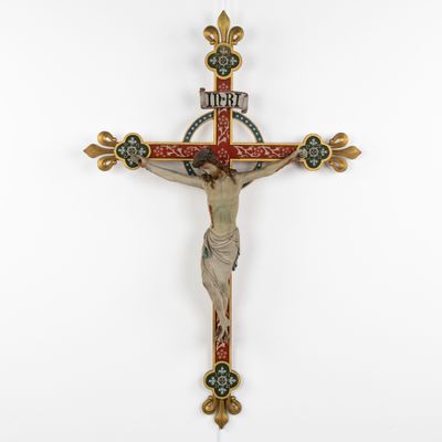 a wooden crucif with a cross on it and a cross on the wall