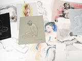 a lot of drawings that are on the table
