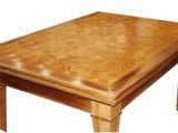 a wooden table with a chess board on top of it