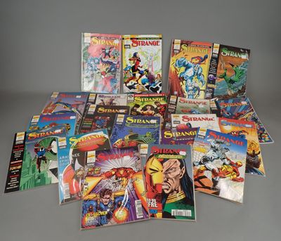 a bunch of comics sitting on top of a table next to each other