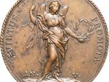 an image of a bronze medal with a woman holding a flower