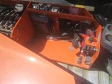 an orange box with a bunch of tools inside of it