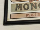 a picture of a sign on the wall of a restaurant