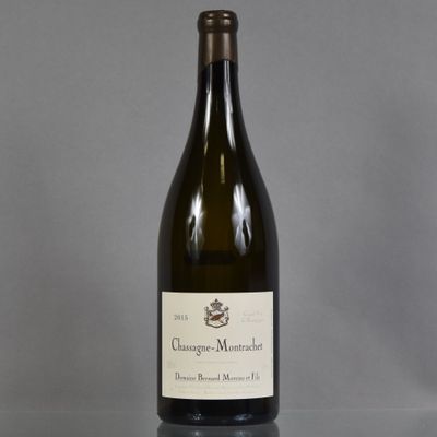 a bottle of wine that is sitting on a table