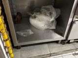 a microwave with a bag of food inside of it
