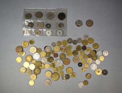 a lot of coins that are sitting on a table