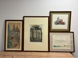 four framed pictures hanging on a wall above a table