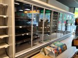 a large display case in the middle of a store