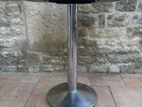 an image of a table with a sign on it
