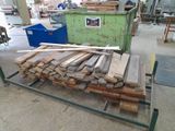 many pieces of wood on a cart in the warehouse