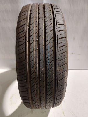 a close up of a tire on a white surface