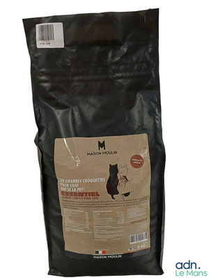 a bag of cat food that is sitting on a table