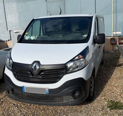 a white van that is parked in a lot