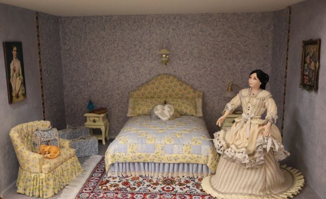 Diorama. Composition miniature, dans une vitrine en bois, vitre e...