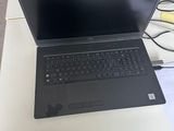 a laptop computer that is sitting on a table