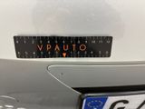 a close up of a number plate on the back of a car