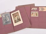 three old photos of a woman and a man are on a book