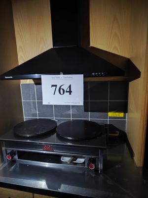 une plaque de cuisson noire sur laquelle figure un chiffre