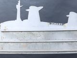 a picture of a model of a ship on a black background