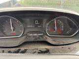 a close up of a car dashboard with a speedometer and gauges