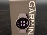 the watch is in the box on the table next to the box