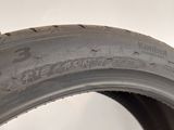 an image of a close up of a tire on a white surface