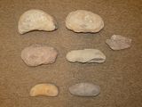 five different types of rocks on the floor