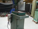 an image of a machine is sitting on a pallet in a warehouse