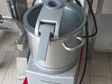 an image of a kitchen with a mixer on the floor