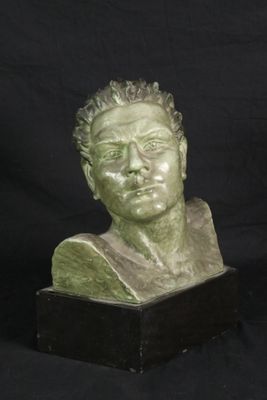 sculpture of a bust of a man on a black background