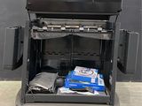 an image of a large black box with some electronics inside