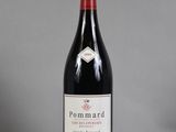 a bottle of wine that is sitting on a table