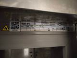 a close up of a sign on the side of a machine