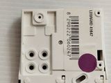 a close up of a small electronic device on a table