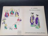 a picture of a book with a picture of a graduation ceremony