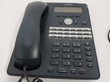 a telephone that is sitting on a table