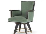 une image représentant une chaise verte aux pieds noirs et à l'assise rembourrée de vert