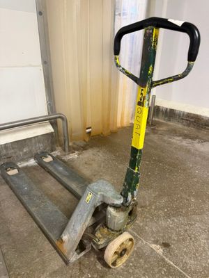 a hand truck that is sitting in a room