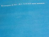 a blue book that has a picture of a plane on it