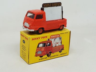 a toy truck that is sitting on top of a box