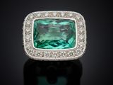 an emerald and diamond ring