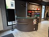 an image of a hair salon with a curved counter