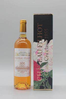une image d'une bouteille de vin à côté d'une boîte de vin