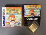 two nintendo games sitting on top of a table next to each other