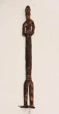 an image of a metal object on a white surface with a white background
