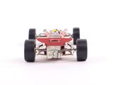 a toy car that is sitting on a white surface