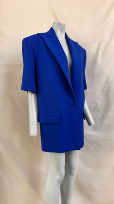 a close up of a mannequin wearing a blue suit on a white mannequin