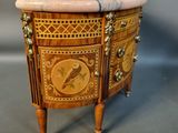 an image of a small wooden table with a marble top
