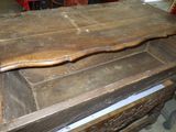 a large wooden box sitting on top of a table